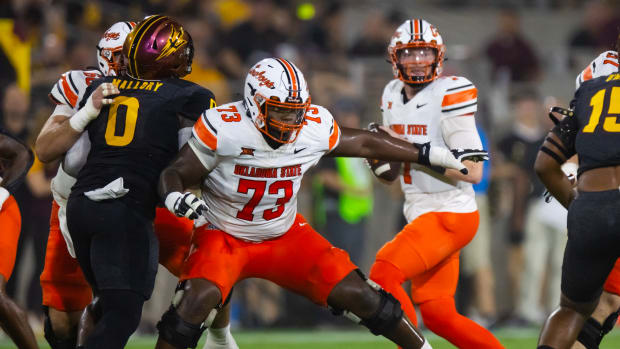 Sep 9, 2023; Tempe, Arizona, USA; Oklahoma State Cowboys offensive lineman Jason Brooks Jr. (73) against the Arizona State Sun Devils at Mountain America Stadium. Mandatory Credit: Mark J. Rebilas-USA TODAY Sports